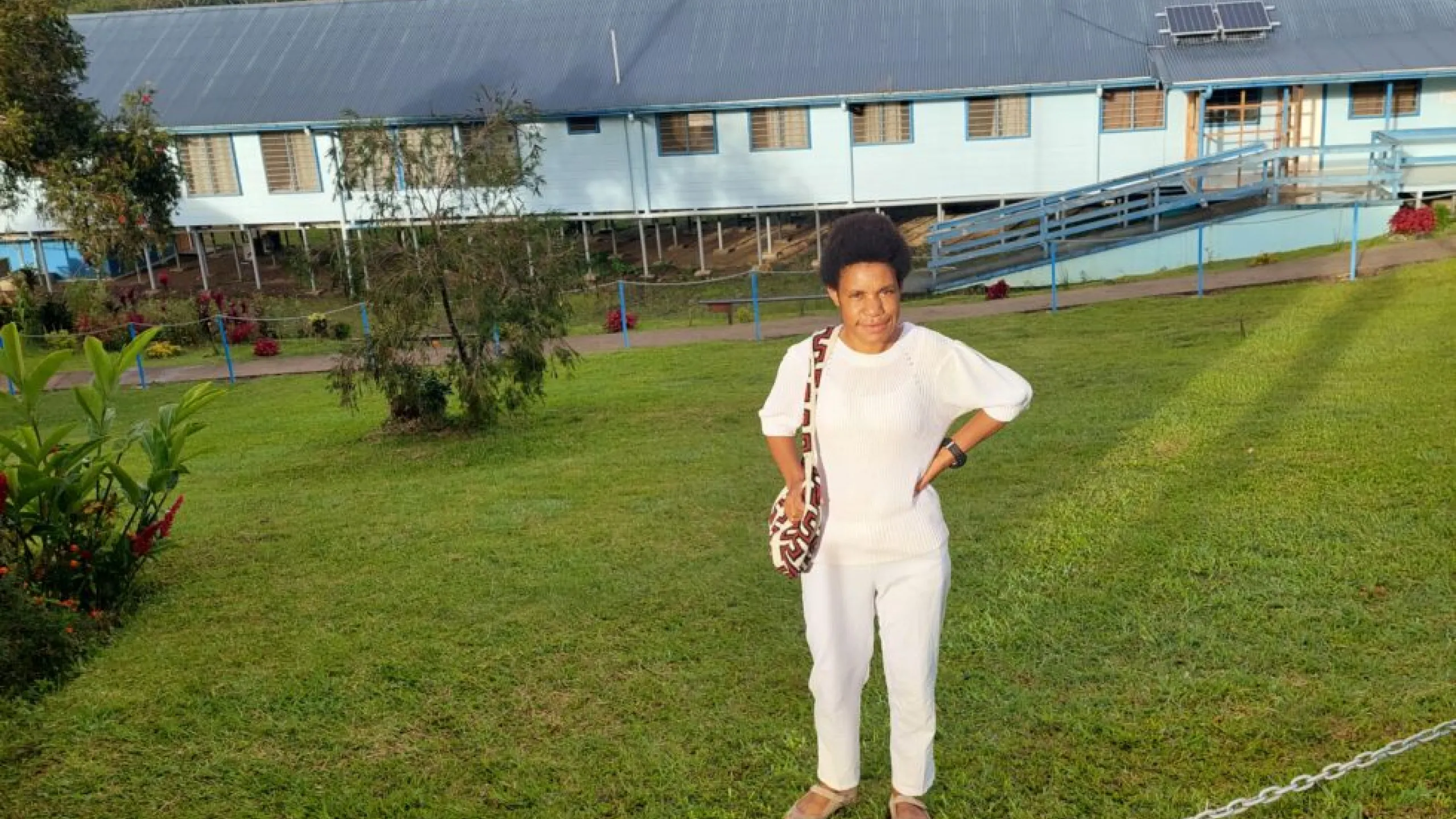 Lalu-Pepna-in-front-of-Kassam-Rural-Hospital-Obura-Wonenara-Eastern-Highlands-Province